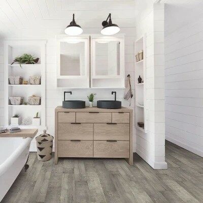 Sango_7.5__x_54__x_12_mm_Maple_Laminate_Flooring_grande laminate flooring in the bathroom | Roberts Carpet & Fine Floors